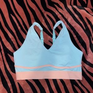 NWOT Light blue and light pink sports bra